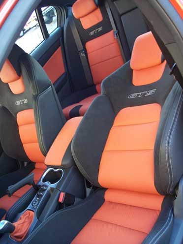 interior of car with orange seats