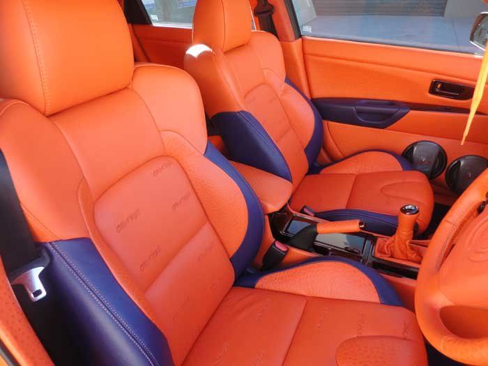 orange and blue front seats
