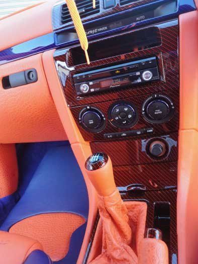 orange stick shifts and car radio