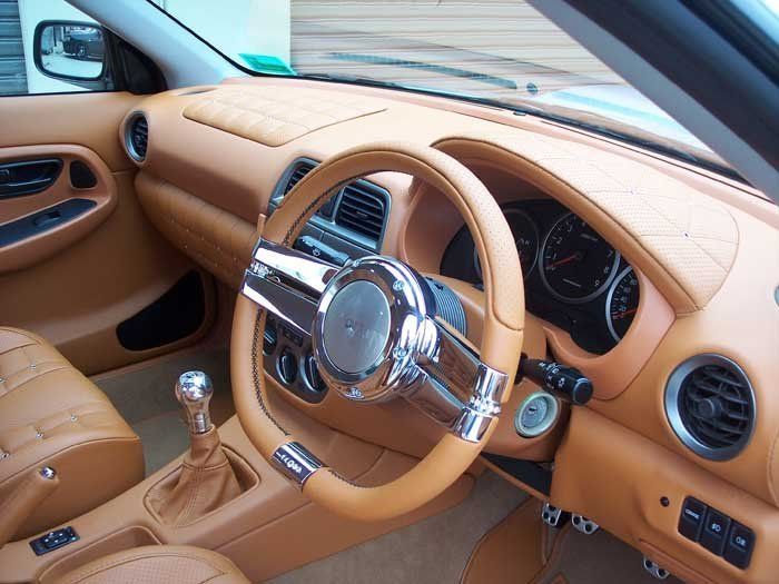 silver and tan steering wheel