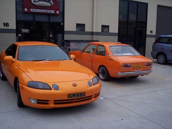 two orange cars
