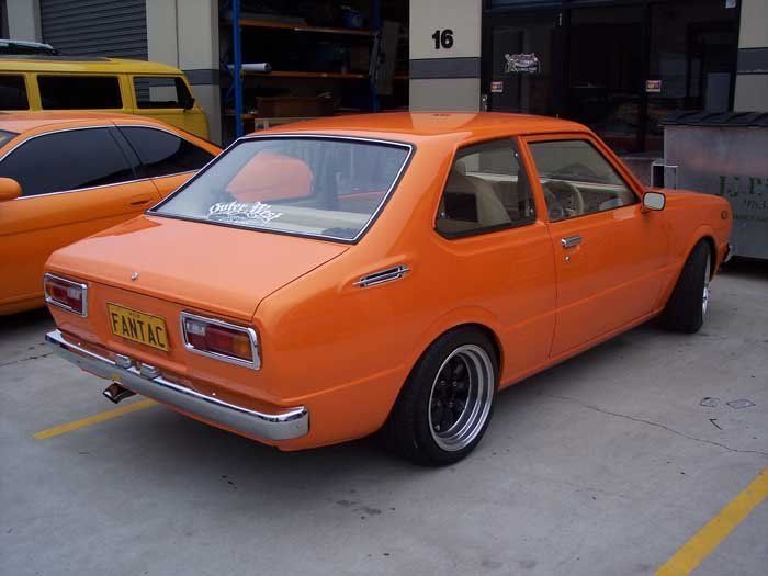 the back of an orange car