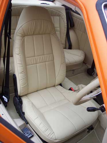 white car seat in orange car