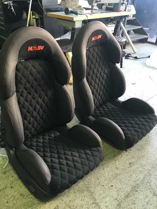 black padded car seats