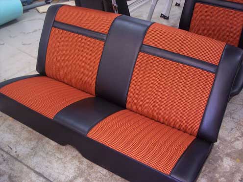 orange seat with dark brown striping