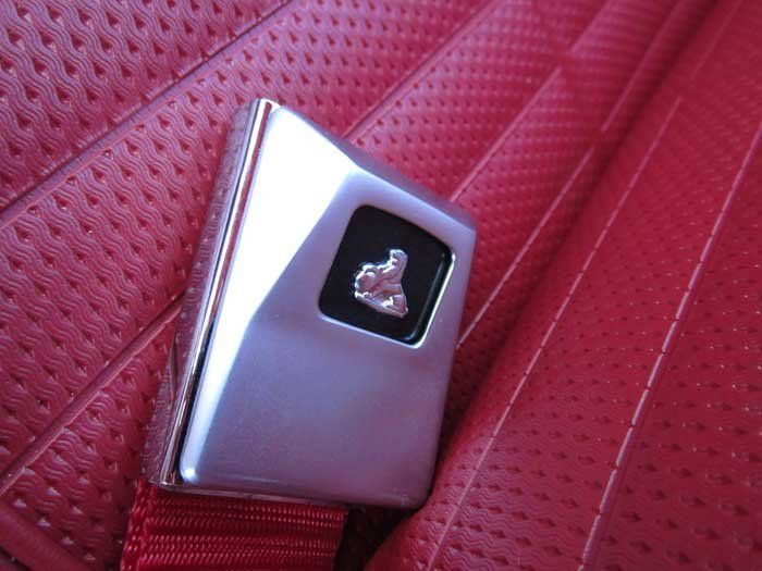 a silver seat belt buckle