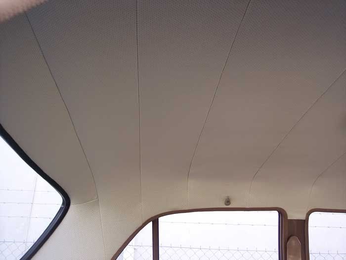 the roof of a car that is tan and white