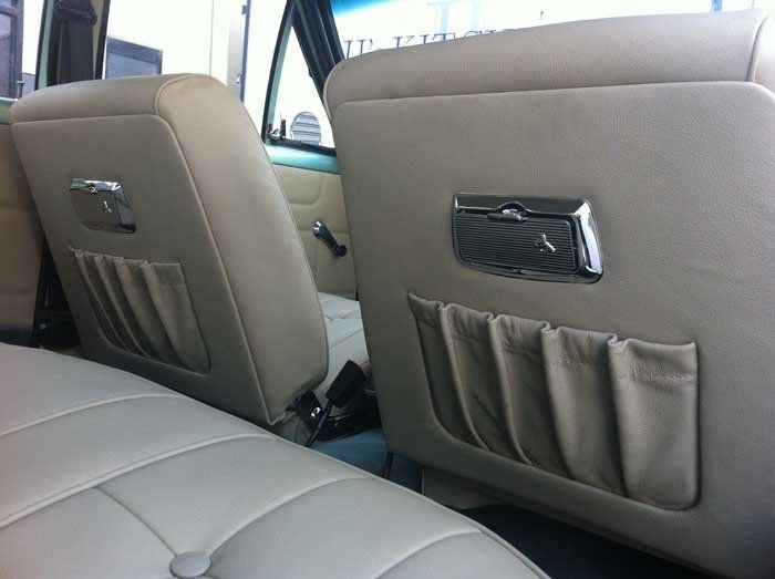the back of car seats with silver embellishments