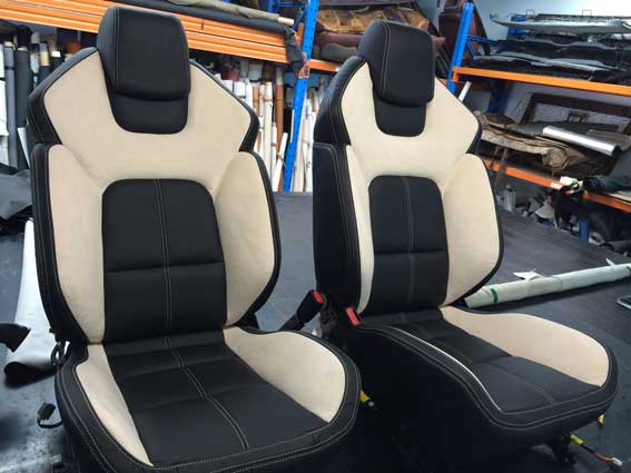 matching black and cream coloured car seats