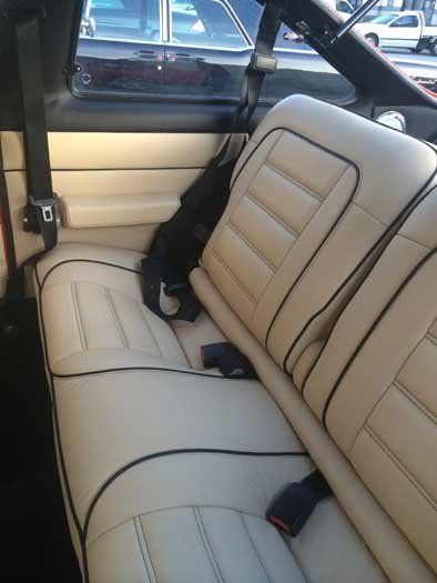 two back seats that are white