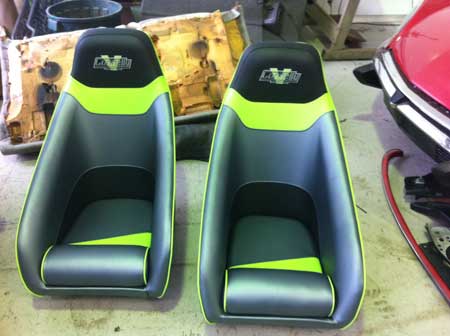two single neon yellow and silver car seats