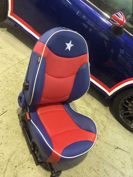 red and navy car seat with star
