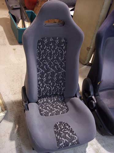 grey car seat with patterns