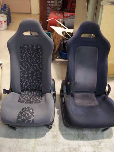 two grey car seats with patterns