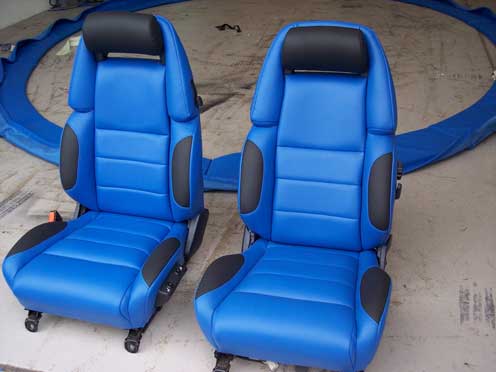 two blue and black car seats