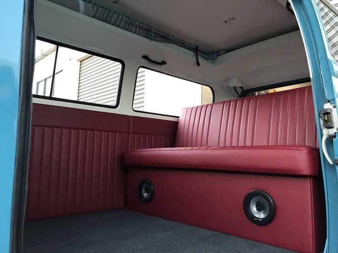 new red bench seat in volkswagen van