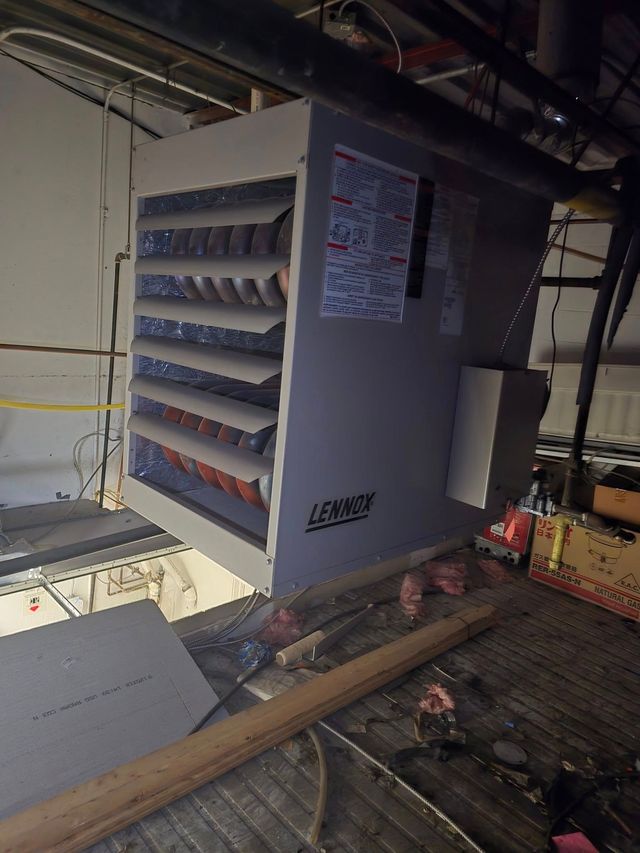 Gray Lennox industrial heater in a building setting.
