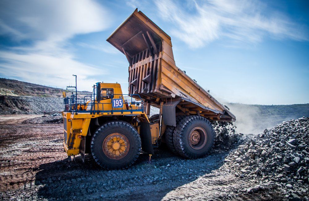 a dump truck in a quarry