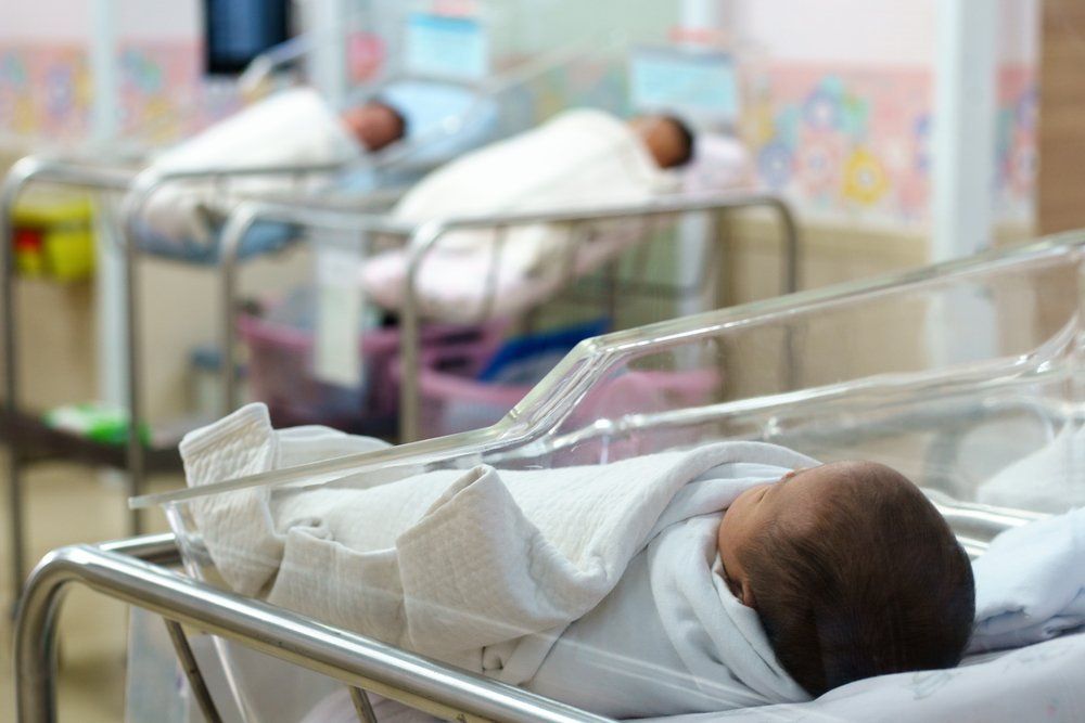 babies in the delivery room of a hospital