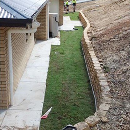 after retaining wall