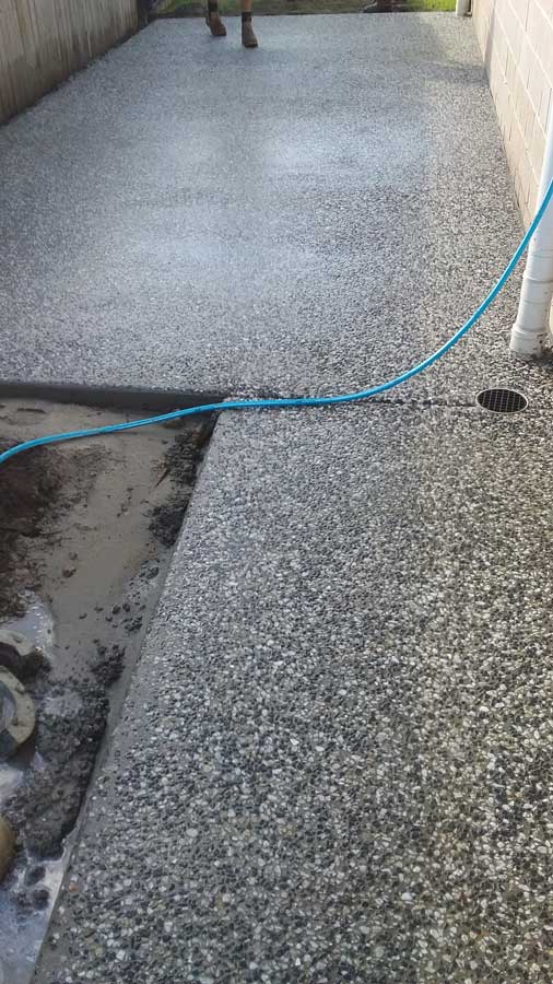 aggregate concrete sidewalk in progress