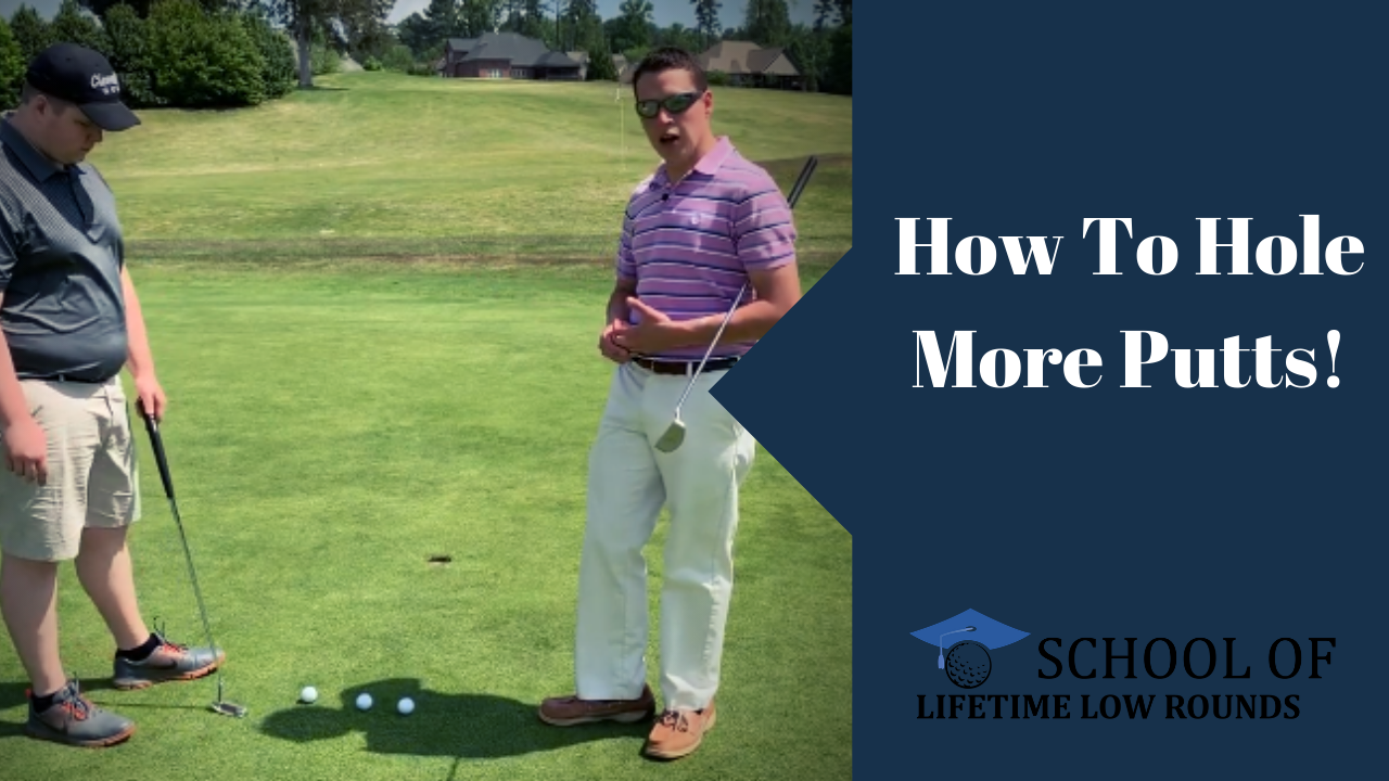 Two men are standing on a golf course talking about how to hole more putts.