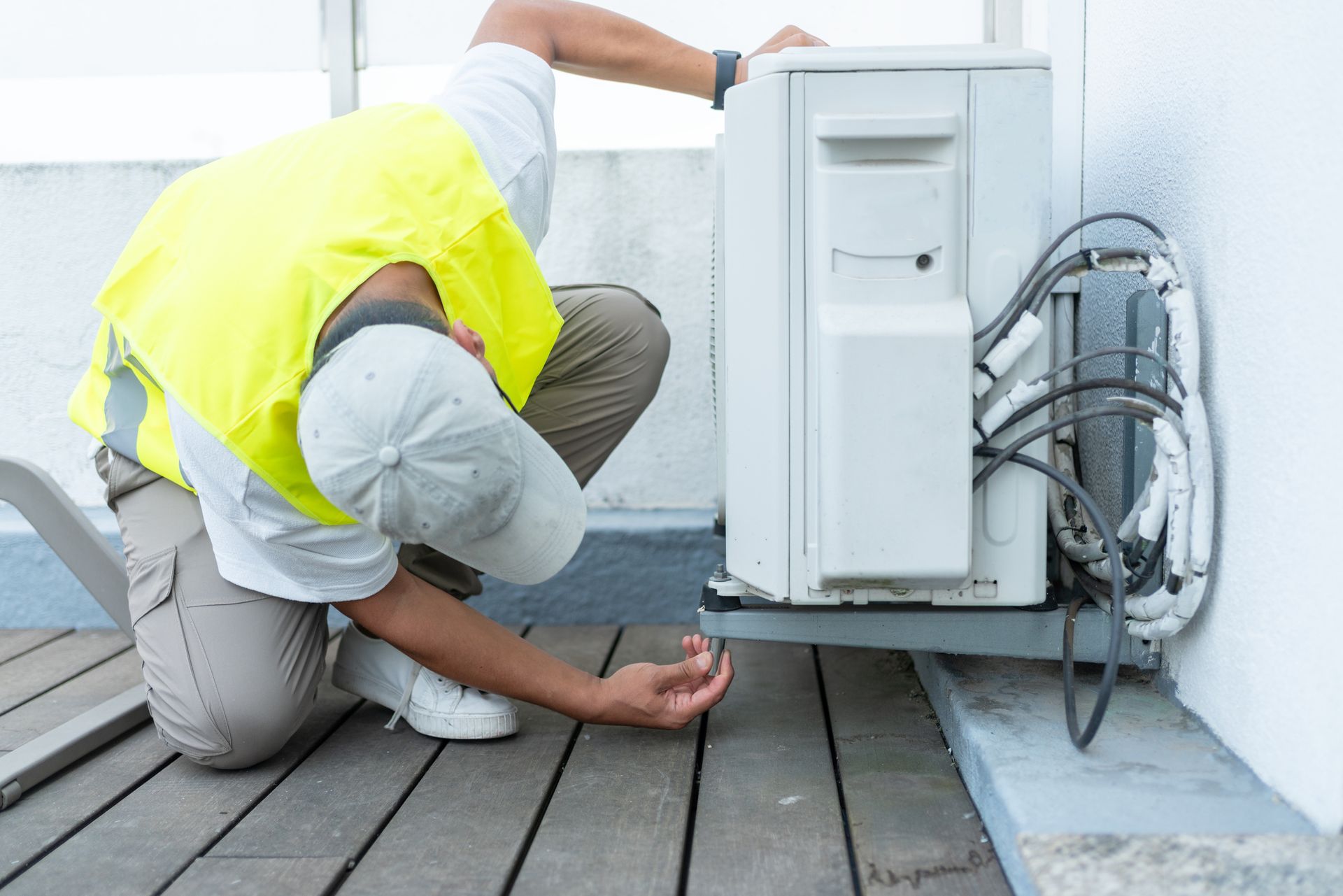Maintenance service for the air conditioning outdoor unit.