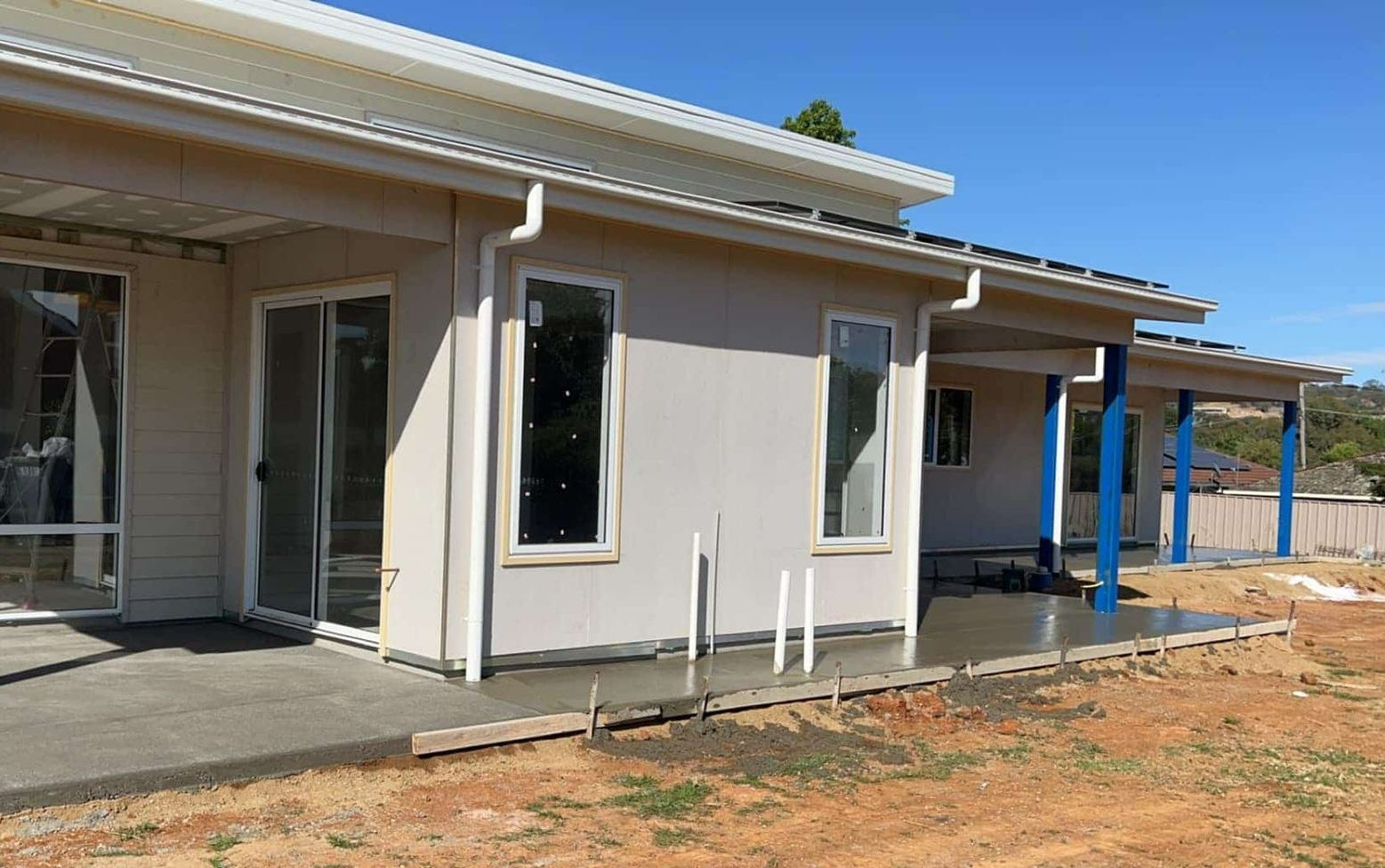 A House is Being Built in the Middle of a Dirt Field — Brycey's Concreting In Frederickton, NSW