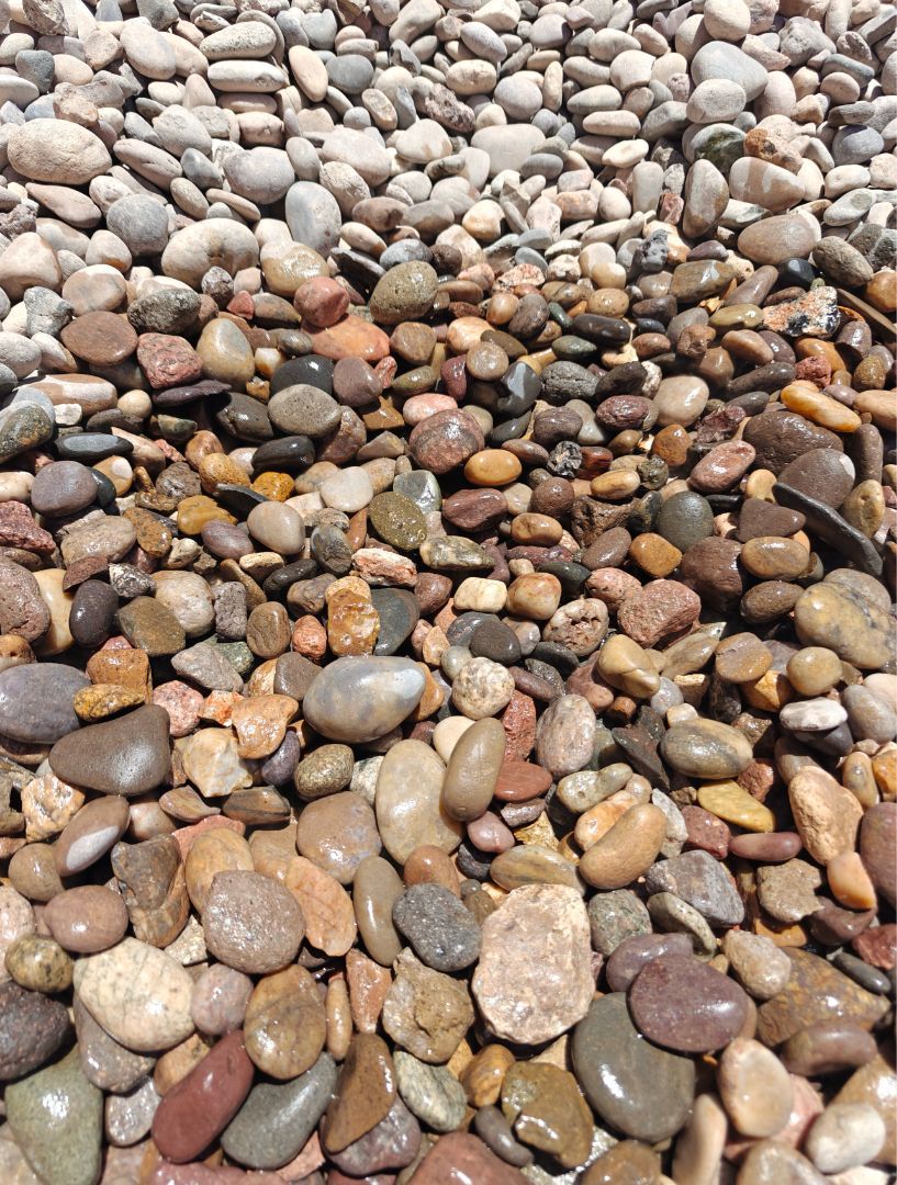 A pile of rocks of different sizes and colors