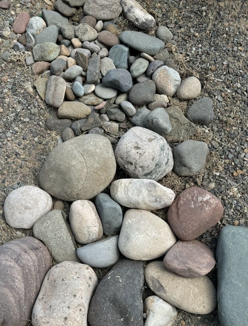 A pile of rocks sitting on top of a wooden pallet.