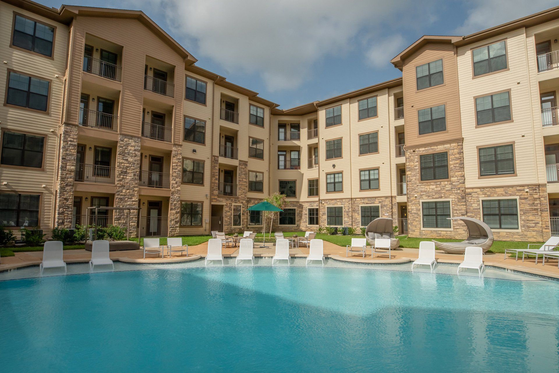 Haven at Liberty Hills | Pool with Apartment View