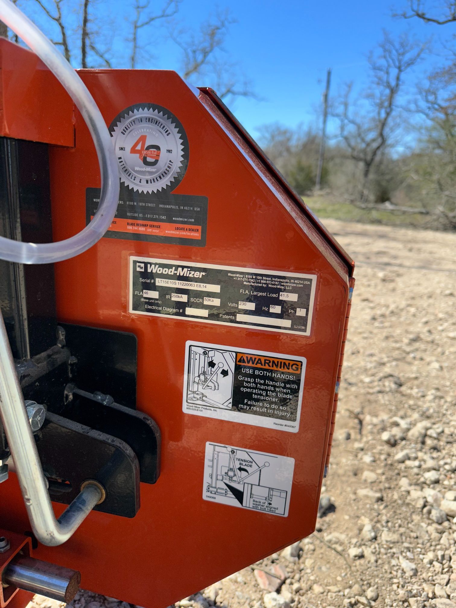 A close up of a machine with a lot of stickers on it.