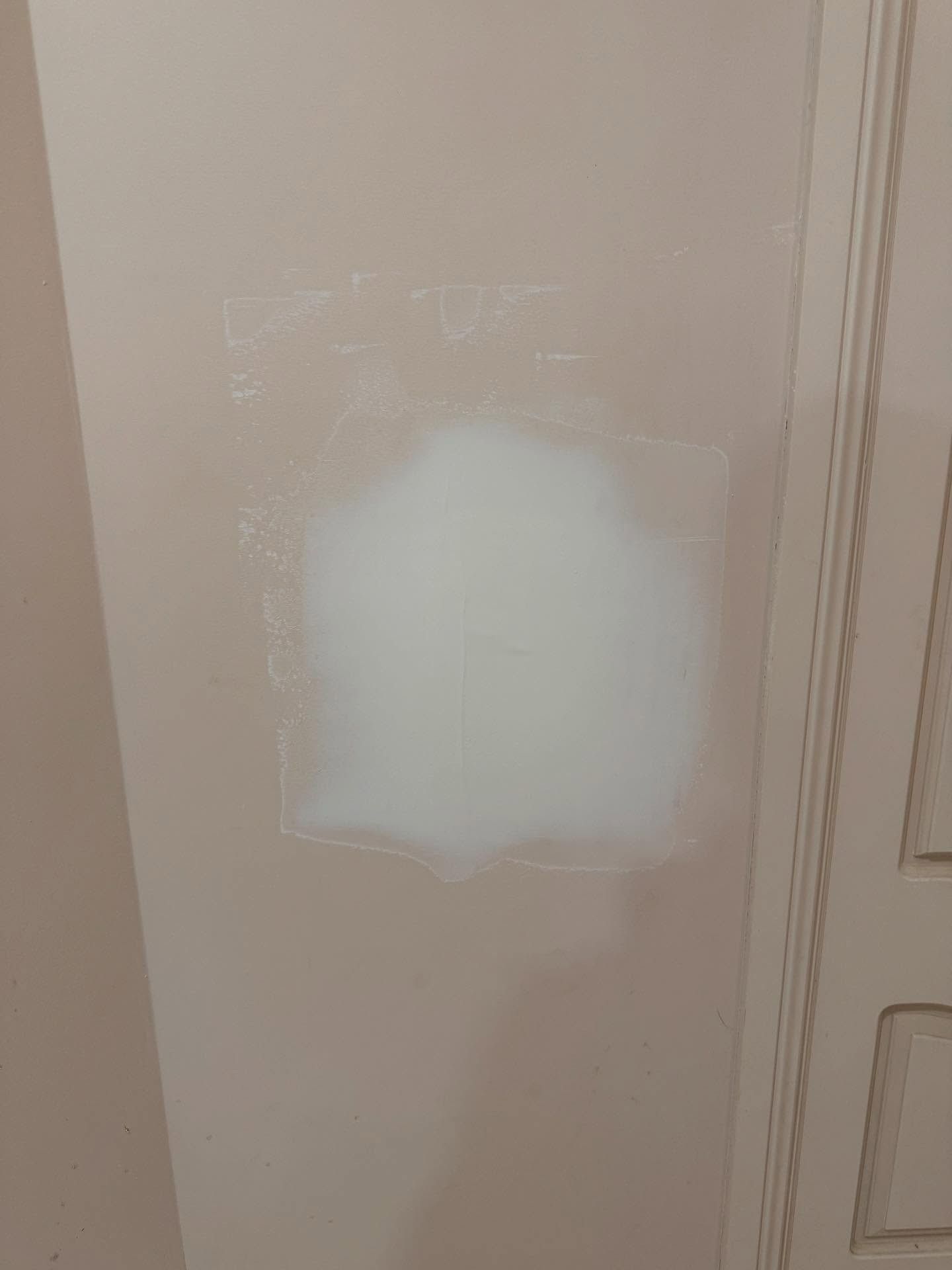 A Close Up of a White Wall Next to a Door — JOA - Construction & Maintenance in Appin, NSW