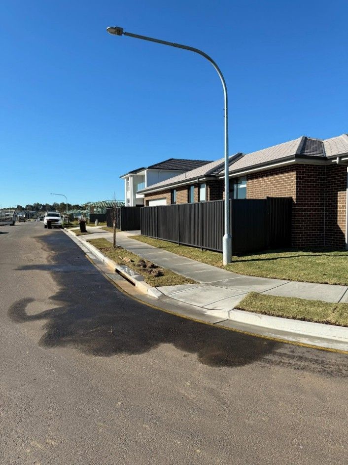 A Street Corner in a Residential Area — JOA - Construction & Maintenance in Appin, NSW