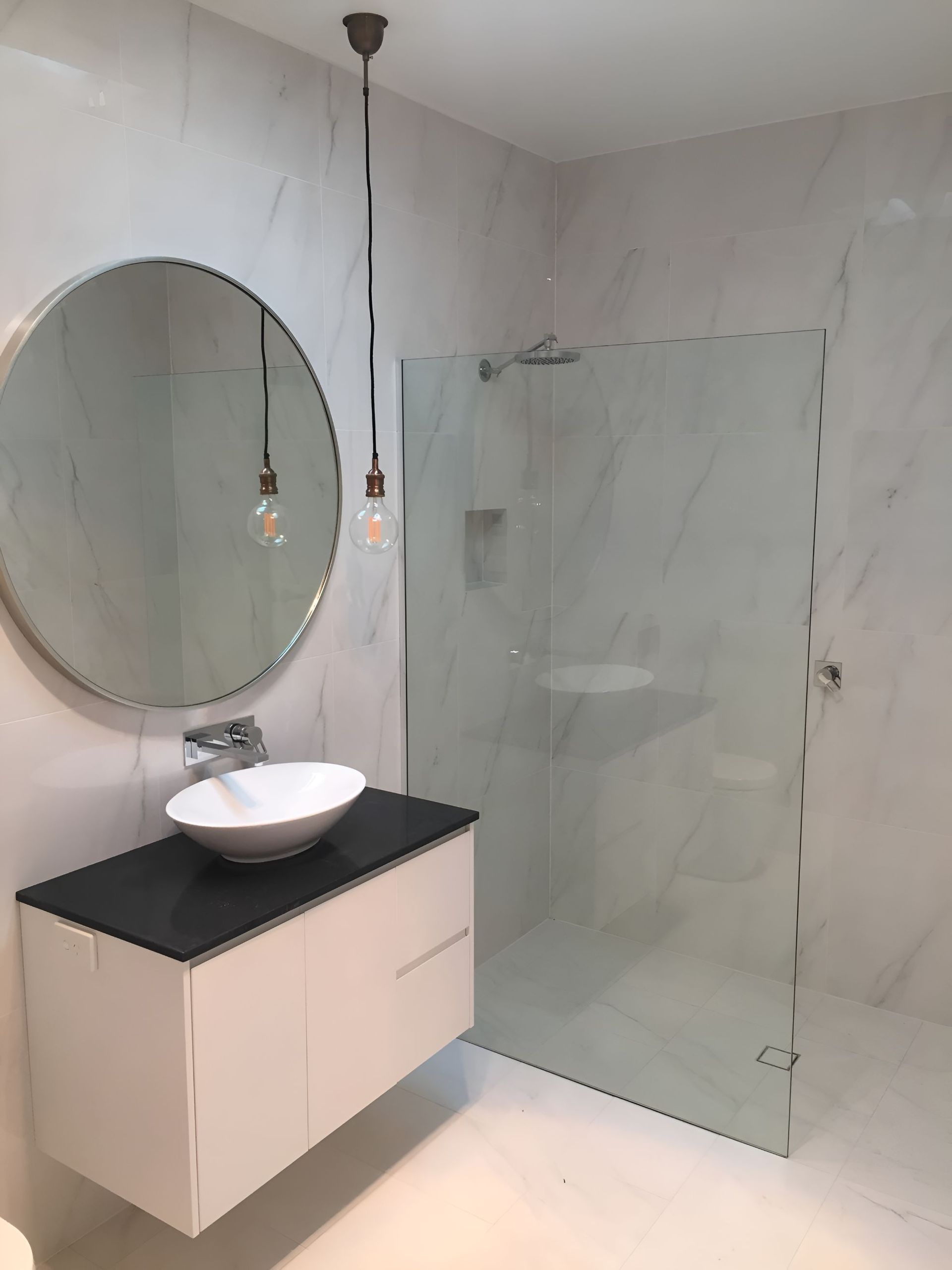 A Bathroom With a Sink, Mirror and Walk in Shower — Canobolas Glass Service In Orange, NSW