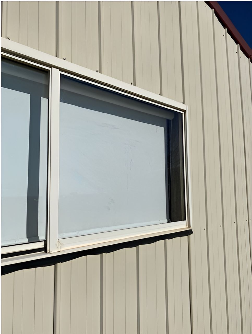 A Window on the Side of a Building With a White Frame — Canobolas Glass Service In Orange, NSW