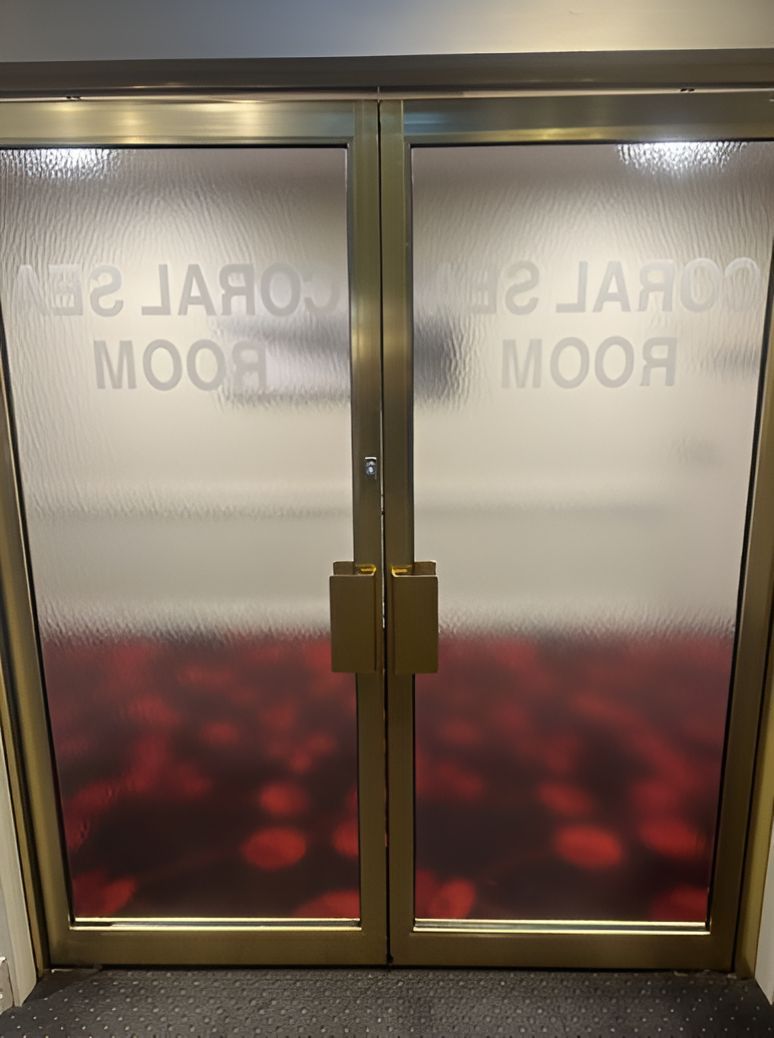 A Door That Has the Word Moose on It — Canobolas Glass Service In Orange, NSW