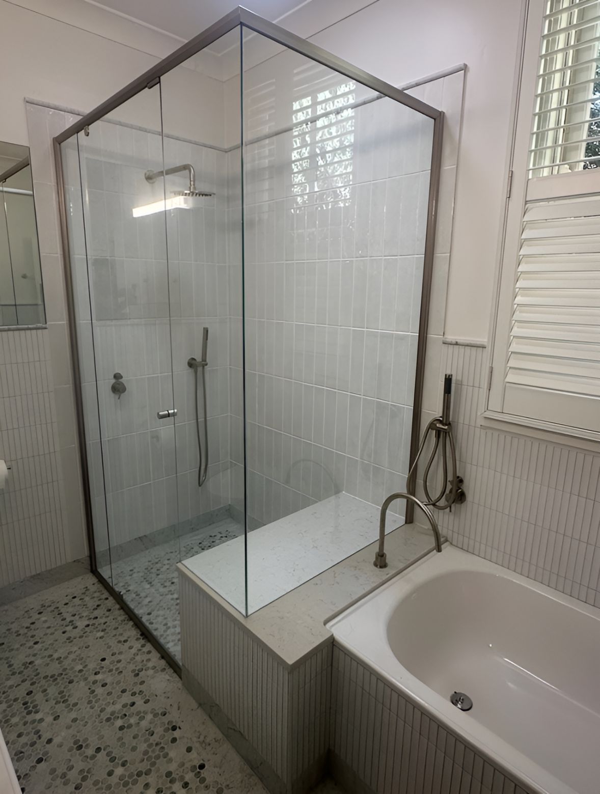 A Bathroom With a Bathtub and a Shower With a Glass Door — Canobolas Glass Service In Orange, NSW