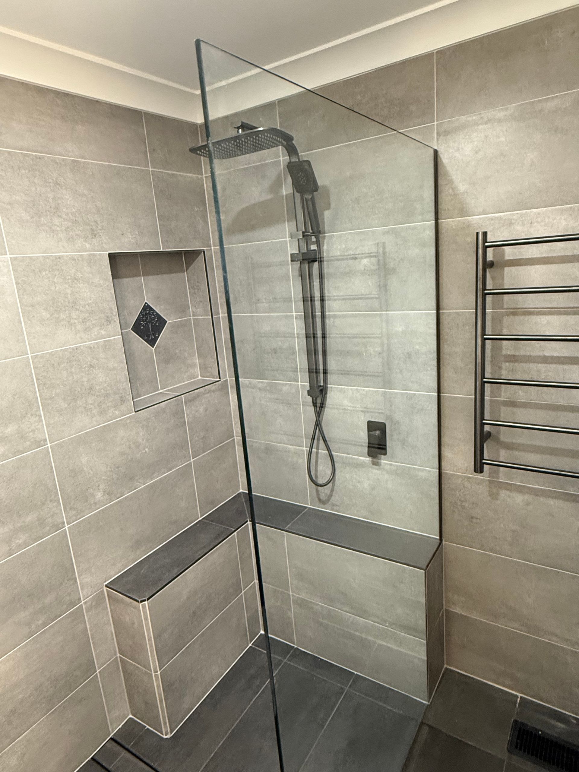 A Bathroom With a open shower with a Glass frame — Canobolas Glass Service In Orange, NSW