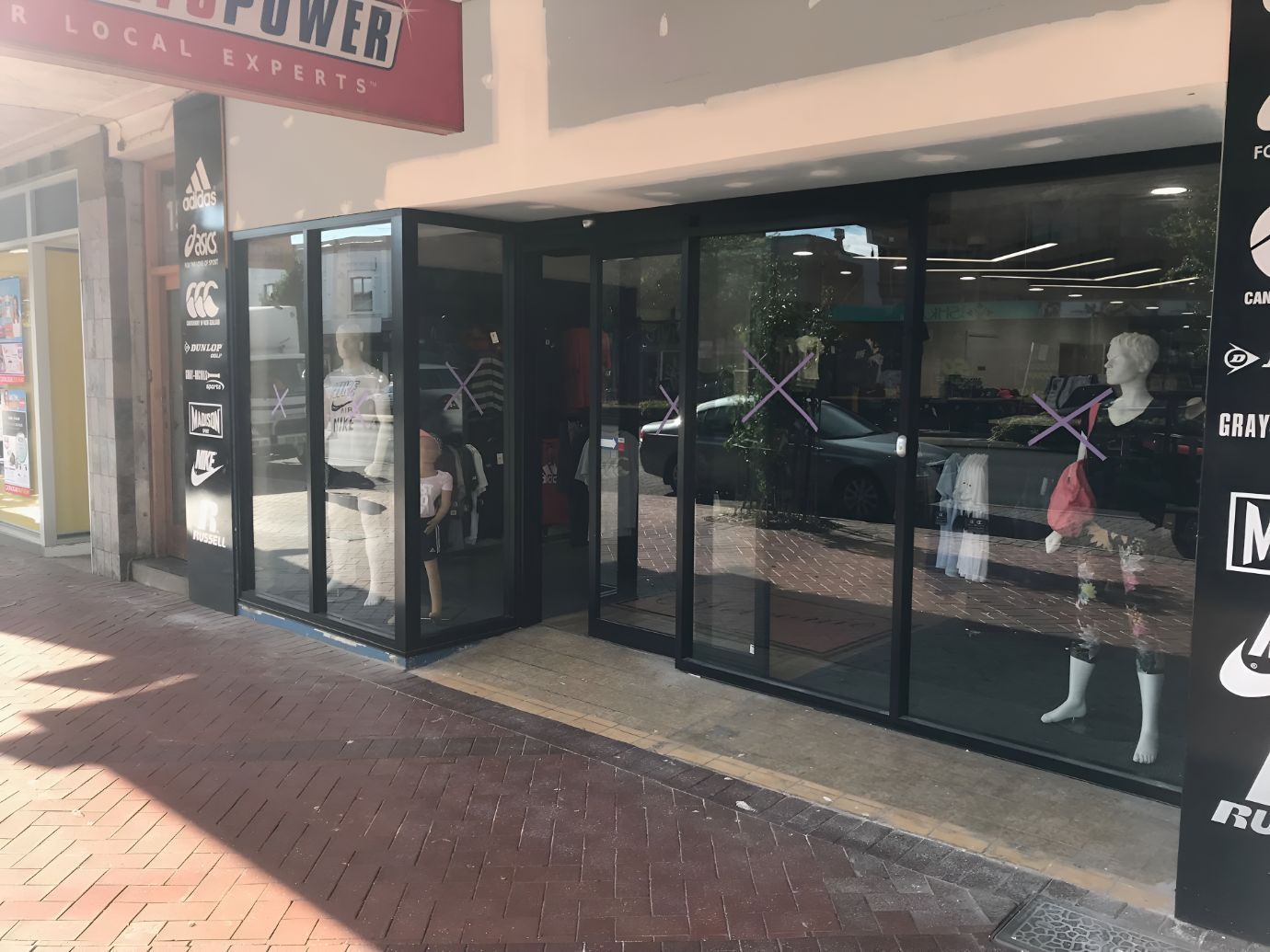 A Store Front With a Lot of Windows and Mannequins in Front of It — Canobolas Glass Service In Orange, NSW