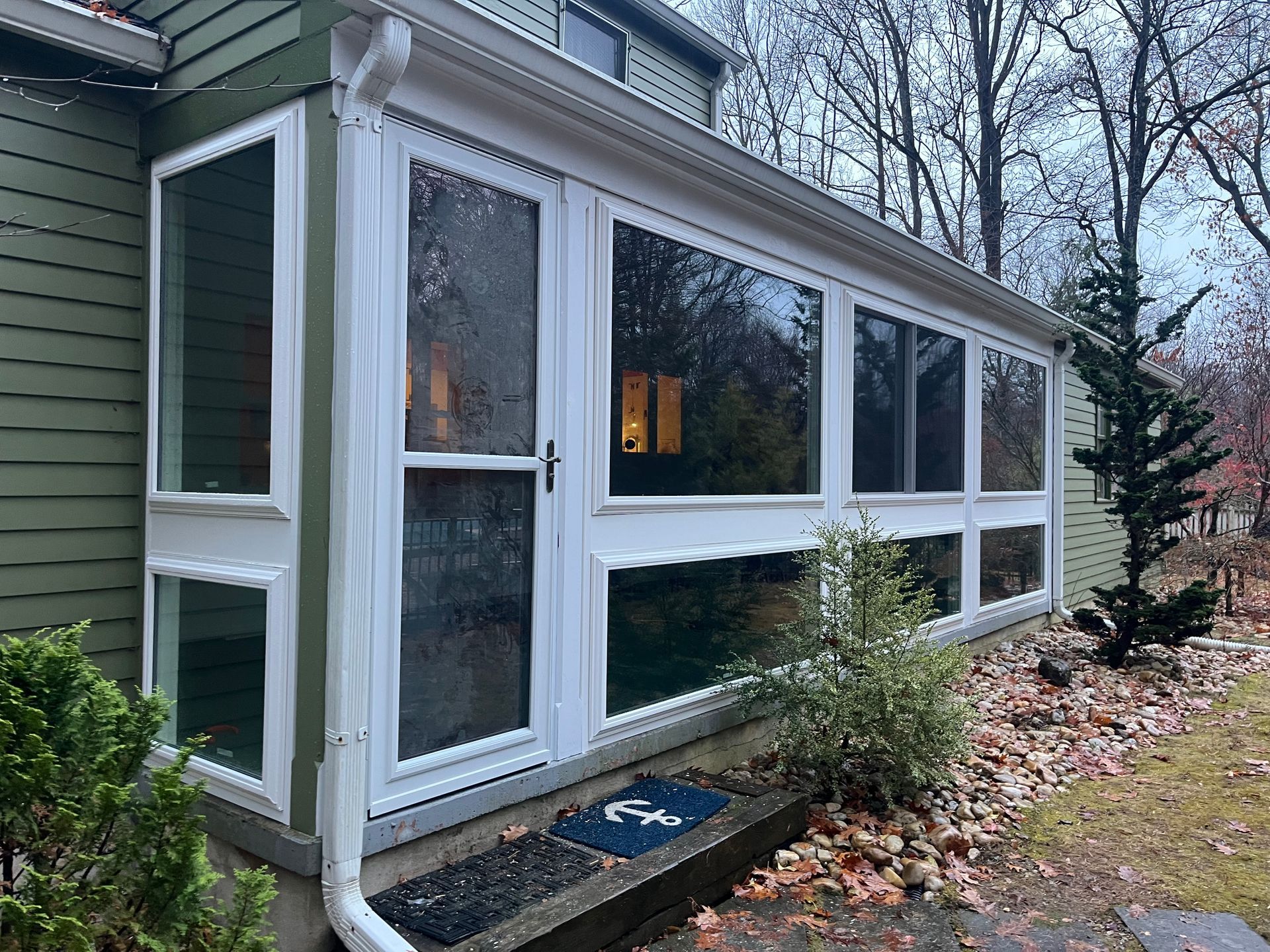 white replacement windows on porch