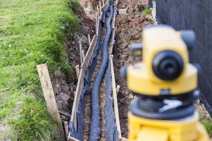 an under installation of backyard drainage