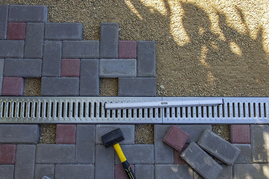 under installation of brick walkway
