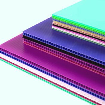 A stack of colorful plastic sheets are stacked on top of each other.