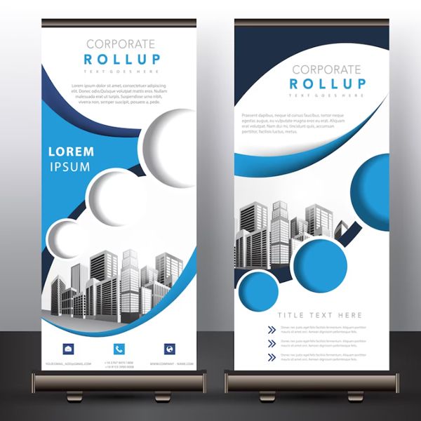 Two corporate roll up banners with buildings on them