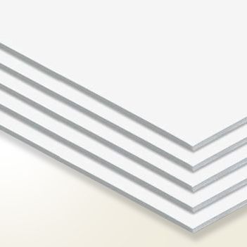 A stack of white sheets of paper sitting on top of each other on a table.