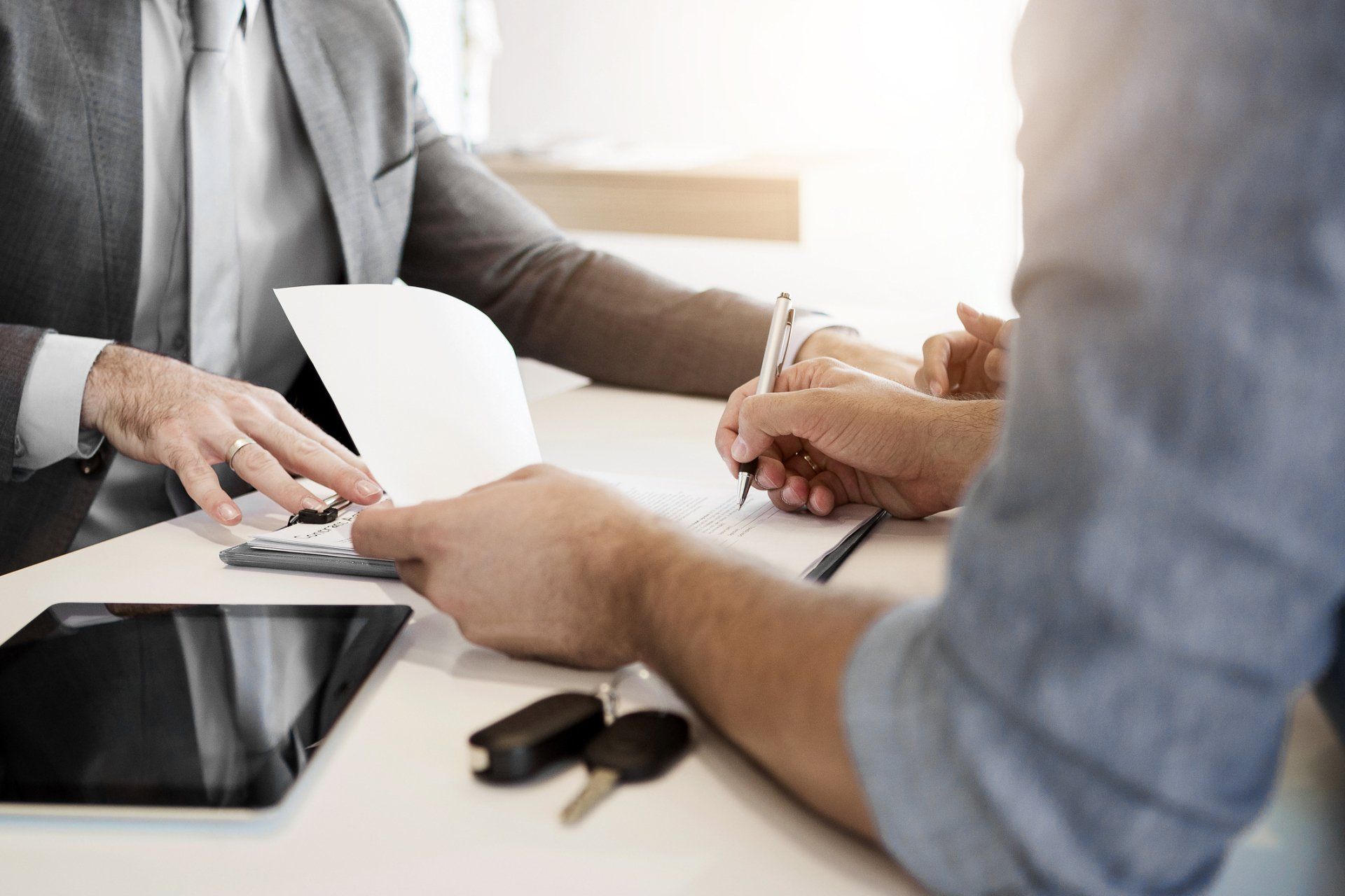 Car Salesman Making a Sale — Fraser, MI — Middleton Auto Parts