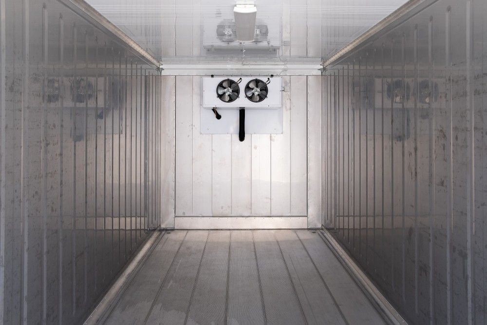 Interior of A Refrigerated Truck with White Walls and A Central Cooling Unit — MAE Refrigeration In Portsmith, QLD