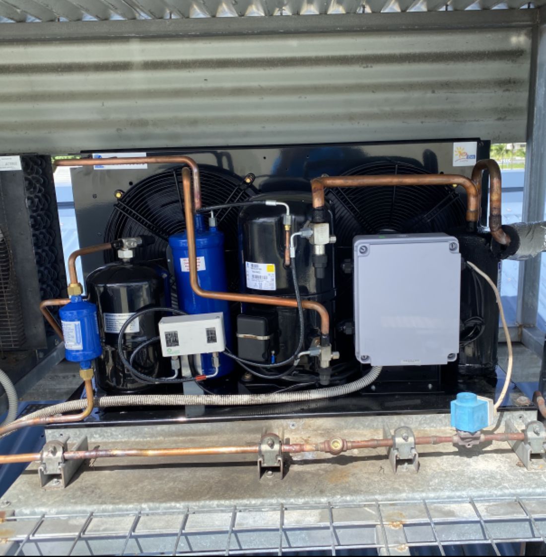 Commercial Refrigeration Unit with Black Components, Copper Pipes