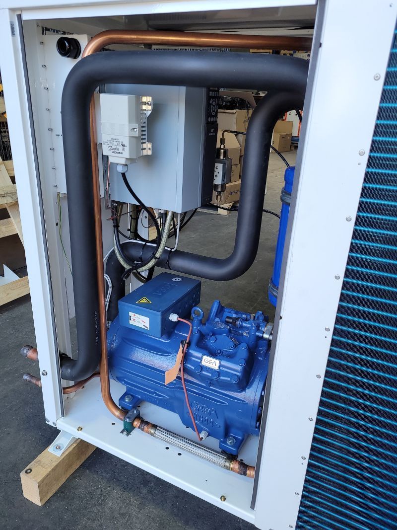 Open View of Air Conditioning Unit, Showing Blue Compressor — MAE Refrigeration In Palm Cove, QLD